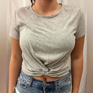 grey cross in the front slightly cropped tee!